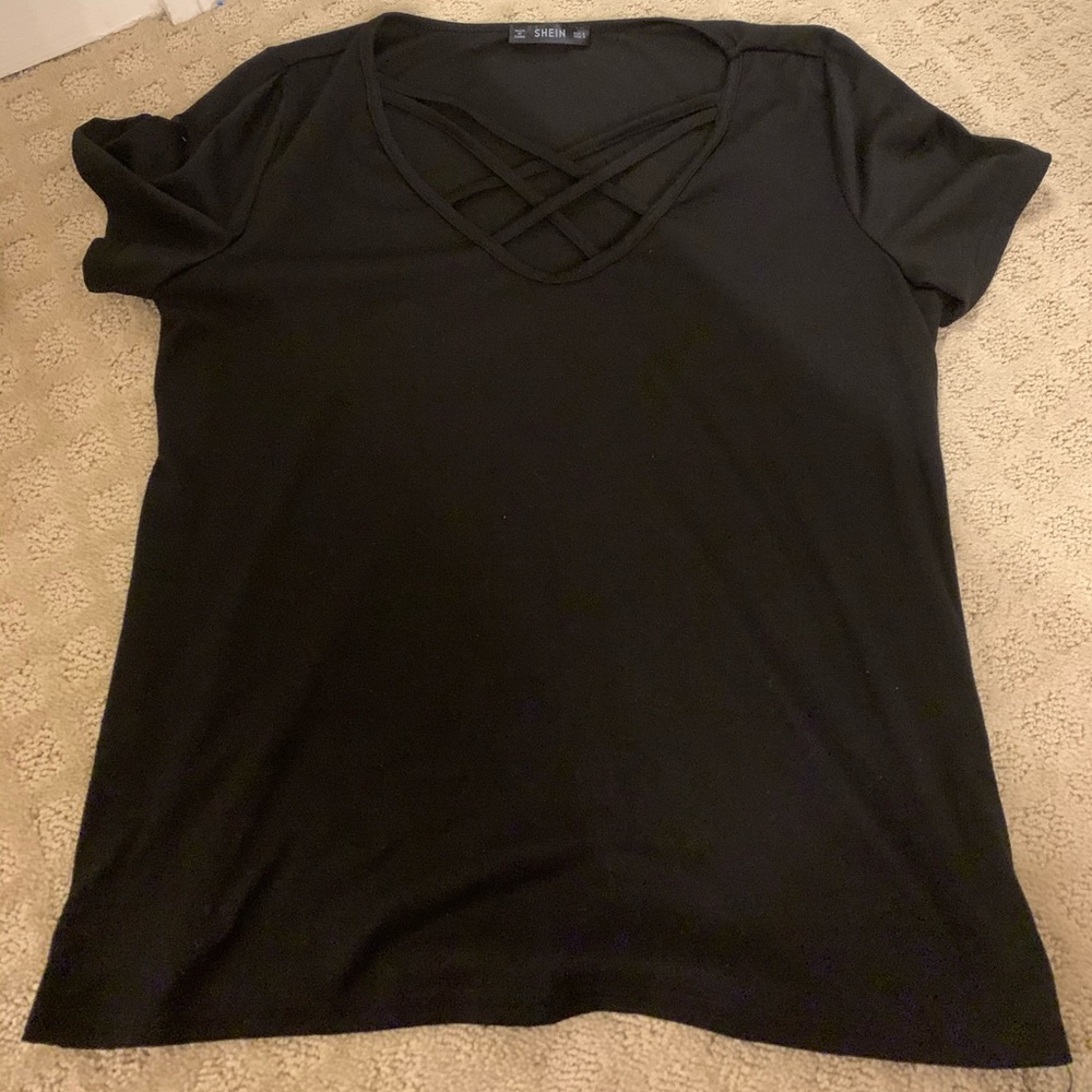 black shirt cross